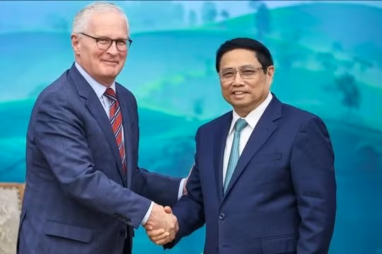 Thủ tướng Phạm Minh Chính tiếp ông John Neffeur, Chủ tịch Hiệp hội Công nghiệp bán dẫn Hoa Kỳ - Ảnh: VGP/Nhật Bắc