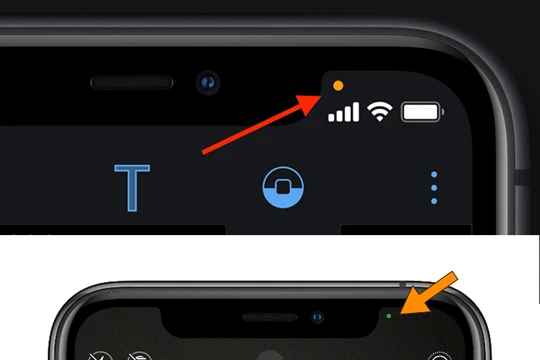 Dấu chấm cam (phía trên) và dấu chấm xanh (bên dưới) iPhone chạy iOS 14.