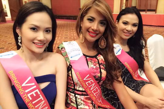 Siêu mẫu Diệu Linh âm thầm đi thi Hoa hậu Du lịch quốc tế 2014.