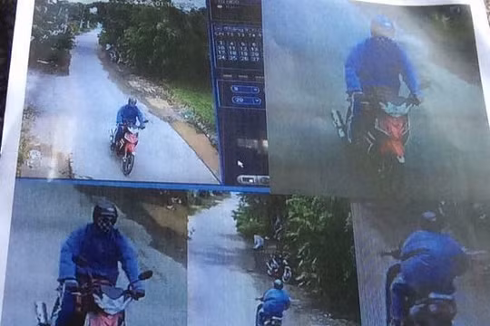 Nghi phạm cướp ngân hàng sử dụng xe máy Sirius màu đỏ đen. Ảnh: Camera an ninh.