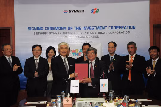 Lễ ký kết giữa FPT và Synnex - Ảnh: FPT