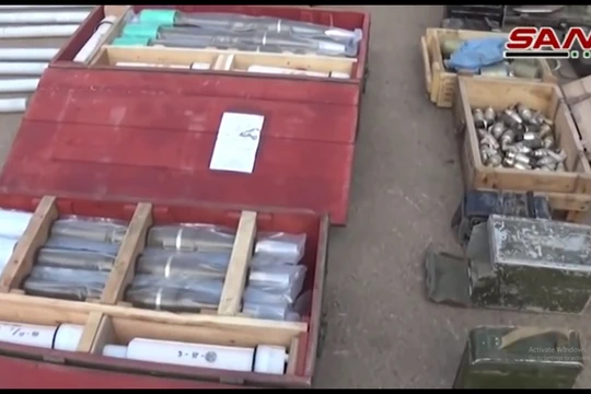Kho vũ khí mới phát hiện tại thành phố Daraa. Ảnh minh họa video SANA