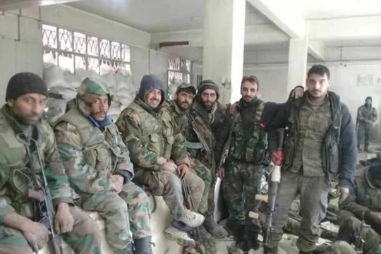 Binh sĩ quân đội Syria chuẩn bị tiến hành cuộc tấn công vào khu vực Đông Ghouta - ảnh minh họa Masdar News