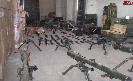 Kho vũ khí thu được ở Quneitra. Ảnh SANA