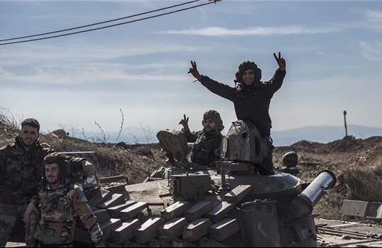 Lực lượng quân tình nguyện Palestine chuẩn bị tiến vào Handarat trên miền Bắc Aleppo