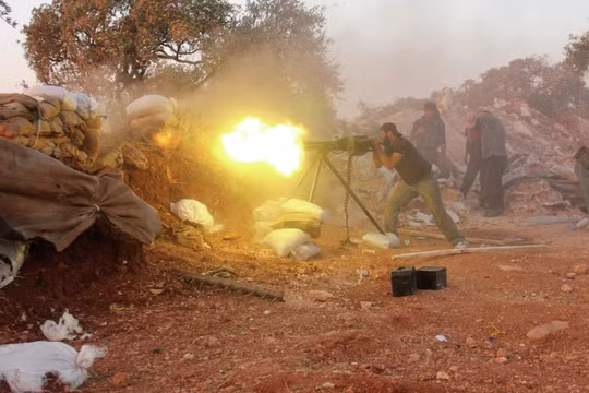 Lực lượng vũ trang địa phương NDF đánh trả các tay súng khủng bố NDF ỏ các thị trấn người Shiite. Ảnh minh họa Masdar News