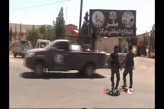 Lực lượng vũ trang địa phương NDF tiến về Al-Quneitra. Ảnh video