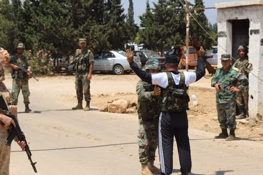 Những tay súng thánh chiến "đối lập" đầu hàng ở tỉnh Homs - ảnh minh họa Masdar News