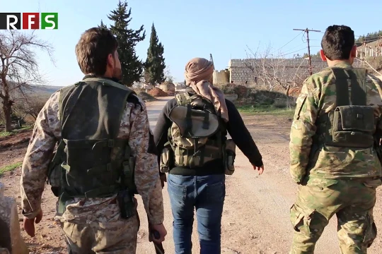 Những chiến binh FSA được Thổ Nhĩ Kỳ hậu thuẫn trên thị trấn Al-Muhammadiyah vùa bị chiếm. Ảnh minh họa Masdar News