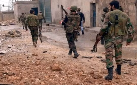 Binh sĩ quân đội Syria ở Rastan tỉnh Homs, ảnh minh họa Masdar News