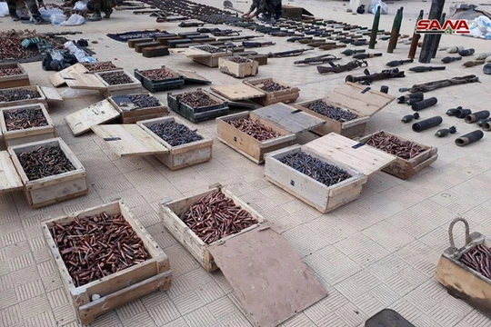 Kho vũ khí khổng lồ của FSA ở thị trấn Barzeh bị quân đội Syria thu giữ. Ảnh minh họa video SANA