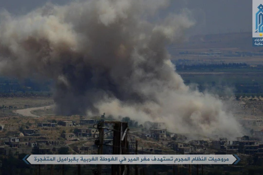 Máy bay trực thăng quân đội Syria ném bom dữ dội làng Mughr al-Meer