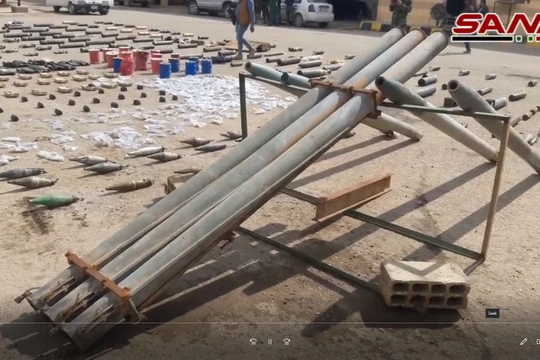 Kho vũ khí của lực lượng khủng bố IS trên chiến trường Deir Ezzor - ảnh video truyền thông SANA