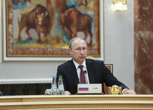 Tổng thống Putin trong cuộc đàm phán 4 bên tìm hướng giải quyết khủng hoảng Ukraine hôm 11/2 tại Minsk, Belarus. Ảnh: Reuters