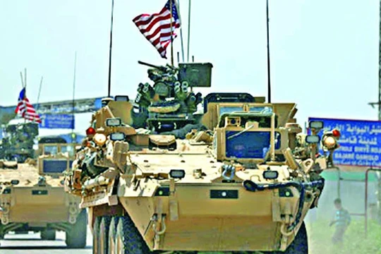 Xe thiết giáp của quân đội Mỹ trong địa phận tỉnh Qamishli