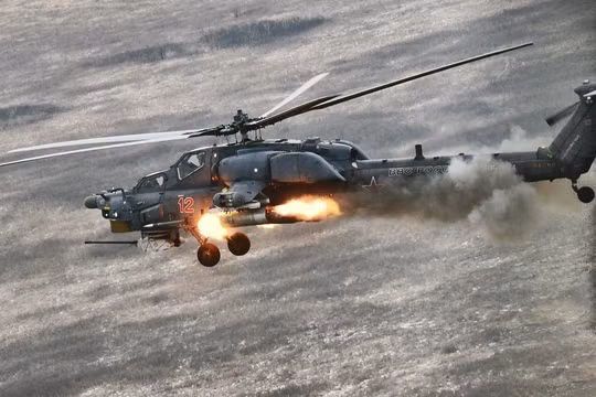 Máy bay trực thăng chiến đấu Mi-28N khai hỏa trên chiến trường Syria. Ảnh Russian Gazeta