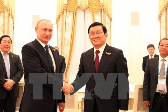 Tổng thống Liên bang Nga Vladimir Putin và Chủ tịch nước Trương Tấn Sang. (Ảnh: Nguyễn Khang/TTXVN)