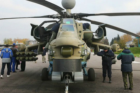 Trực thăng tấn công "Thợ săn đêm" Mi-28 NM đến Syria. Ảnh: Sputnik.