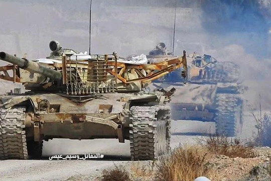 Tăng, thiết giáp quân đội Syria trên chiến trường Đông Ghouta - ảnh minh họa Masdar News