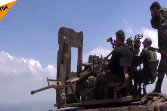 Lực lượng Hồi giáo cực đoan sẵn sàng cho cuộc chiến với quân đội Syria ở Lattakia. Ảnh minh họa video Sputnik.