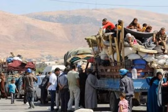 Những người dân di tản Syria trở về từ các nước láng giềng lân cận. Ảnh minh họa Masdar News