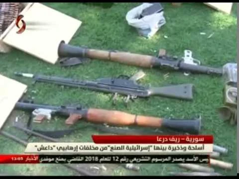 Quân đội Syria thu giữ kho vũ khí của IS ở Daraa. Ảnh minh họa kênh truyền hình Al-Ikhbariya