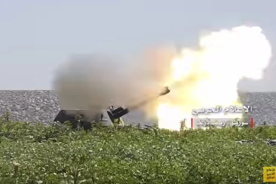 Pháo binh quân dội Syria hoạt động trên chiến trường Daraa. Ảnh minh họa South Front