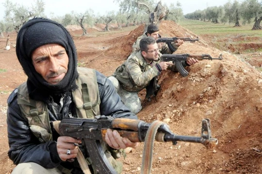 Các tay súng khủng bố Al-Qaeda trên chiến trường Syria. Ảnh minh họa: Masdar News.