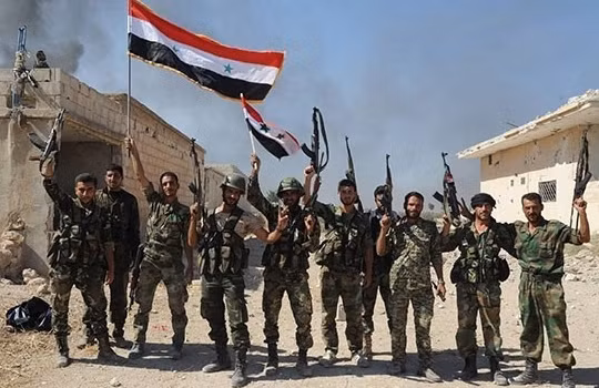 Binh sĩ quân đội Syria giải phóng một ngôi làng ở Hama