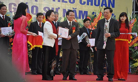 Có 59 người được trao giấy chứng nhận đạt tiêu chuẩnchức danh giáo sư năm 2014. (Ảnh: Văn Chung)