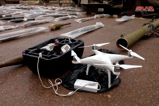 Vũ khí và máy bay trinh sát không người lái UAV, được thu giữ tại Daraa. Ảnh: SANA.