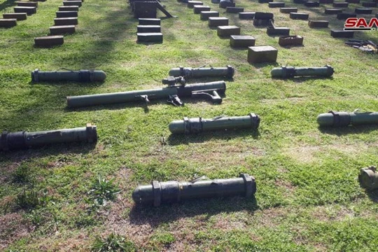 Quân đội Syria thu giữ chiến lợi phẩm trên chiến trường các tỉnh Homs, Daraa, Damascus. Ảnh: SANA.