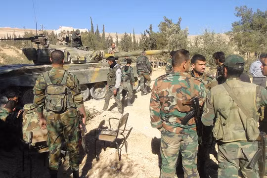 Binh sĩ lực lượng An ninh Quân đội Syria trên vùng ngoại ô Damascus.