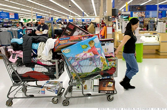 Wal-Mart có hơn 10.400 siêu thị ở 27 quốc gia (năm 2011) với hơn 2,2 triệu nhân viên, phục vụ hơn 200 triệu lượt khách mỗi tuần - Ảnh: Getty Images