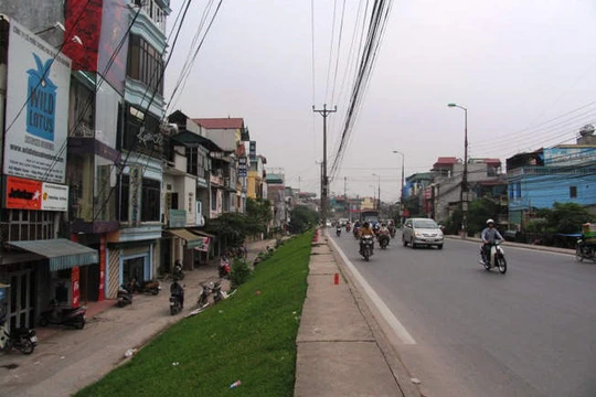 Đoạn đê hiện này đang được đề nghị thay bằng đê bê tông. Ảnh Vietnamnet