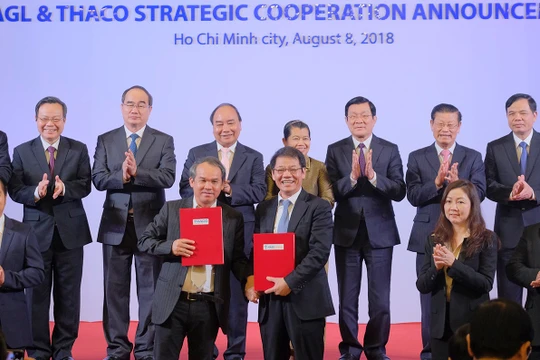 Lễ công bố hợp tác chiến lược của Công ty Cổ phần Hoàng Anh Gia Lai (HAGL) và Công ty Cổ phần Ô tô Trường Hải (Thaco). Ảnh: VGP/Quang Hiếu