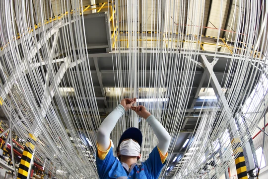 Hoạt động sản xuất của Trung Quốc tăng mạnh trong tháng 2 (Ảnh: China Daily)