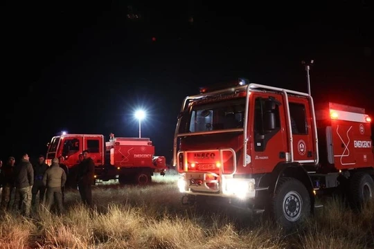 Các quan chức Gruzia tại hiện trường vụ rơi máy bay vận tải C-130 của Không quân Thổ Nhĩ Kỳ. Ảnh: Getty.