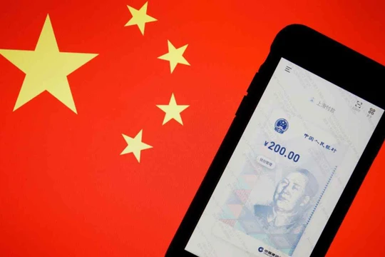 Việc mở rộng sử dụng đồng tiền số của Trung Quốc mang tới nhiều cơ hội, nhưng cũng không ít thách thức (Ảnh: Reuters)