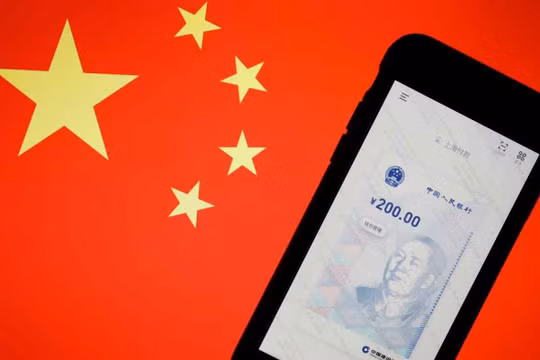 Việc mở rộng sử dụng đồng tiền số của Trung Quốc mang tới nhiều cơ hội, nhưng cũng không ít thách thức (Ảnh: Reuters)