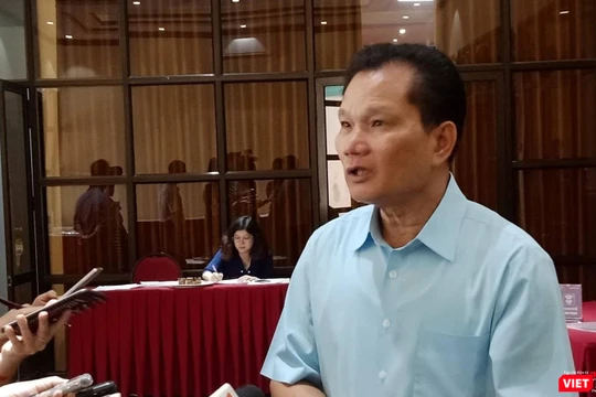 Ông Bùi Sỹ Lợi - Phó Chủ nhiệm Ủy ban về Các vấn đề xã hội của Quốc hội trả lời phỏng vấn bên lề hội thảo.