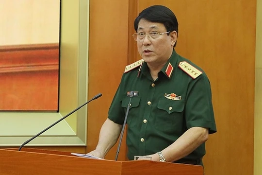 Đại tướng Lương Cường trình bày báo cáo tại hội nghị.