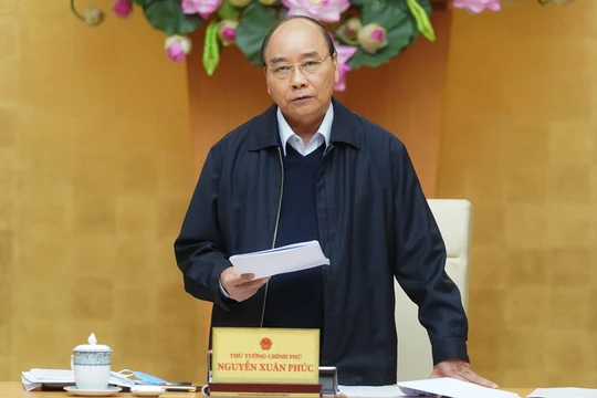 Thủ tướng Nguyễn Xuân Phúc yêu cầu việc chi trả hỗ trợ phải thuận lợi cho người lao động, người gặp khó khăn. Ảnh: VGP/Quang Hiếu