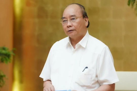 Thủ tướng Nguyễn Xuân Phúc đề nghị xác lập tình trạng bình thường mới trong cuộc sống và các hoạt động kinh tế - xã hội. Ảnh: VGP