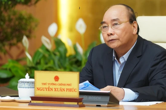 Thủ tướng Nguyễn Xuân Phúc phát biểu tại cuộc họp. Ảnh: VPCP.