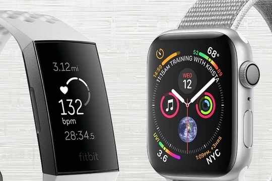 Fitbit Charge 3 và Apple Watch Series 4. Ảnh: Gadgetsandwearables