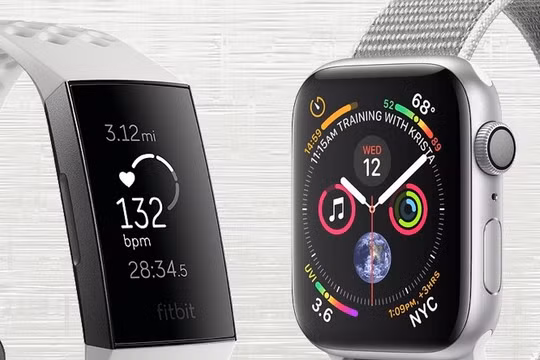 Fitbit Charge 3 và Apple Watch Series 4. Ảnh: Gadgetsandwearables