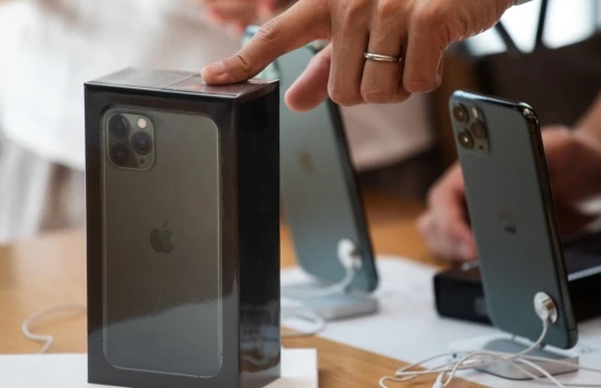 Thỏa thuận thương mại ban đầu của Tổng thống Mỹ Donald Trump với Trung Quốc đã giúp Apple thoát được khoản thuế 15% đối với các sản phẩm quan trọng của công ty. Ảnh: Bloomberg