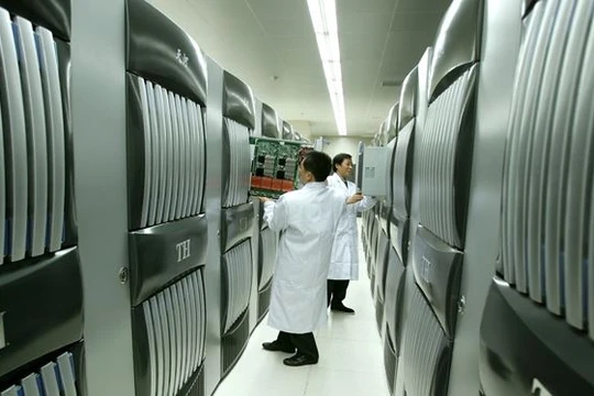 Siêu máy tính Tianhe-1 nặng 150 tấn, chiếm diện tích 1.000 m2. Ảnh: Xinhua.