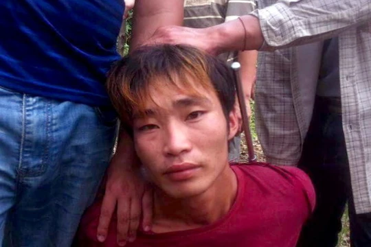 Nghi can Đặng Văn Hùng khi bị bắt sáng 15-8